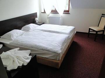Фото номера Двухместный номер с 1 кроватью или 2 отдельными кроватями Отель Hotel Cynamon г. Tokarnia 8